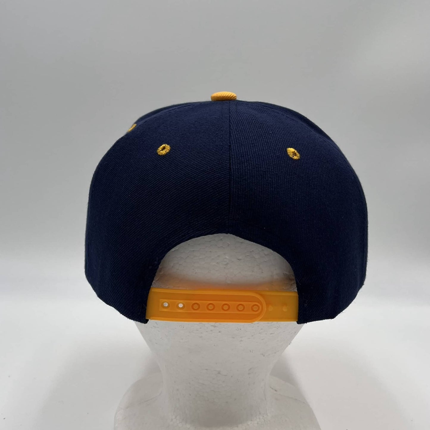 Plain Poly Snapback Navy Blue and Yellow Eyelets/Bill 12 pack PFS0545 Cap Hat