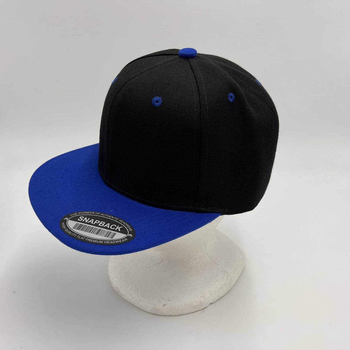 Alpha Omega Cap Plain Poly Snapback Black and Blue Eyelets/Bill 12 pack PFS0549 Cap Hat