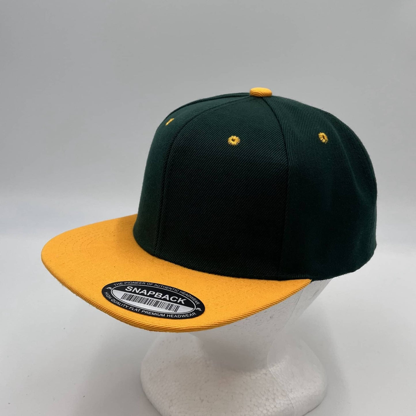 Alpha Omega Cap Plain Poly Snapback Green and Yellow Eyelets/Bill 12 pack PFS0544 Cap Hat