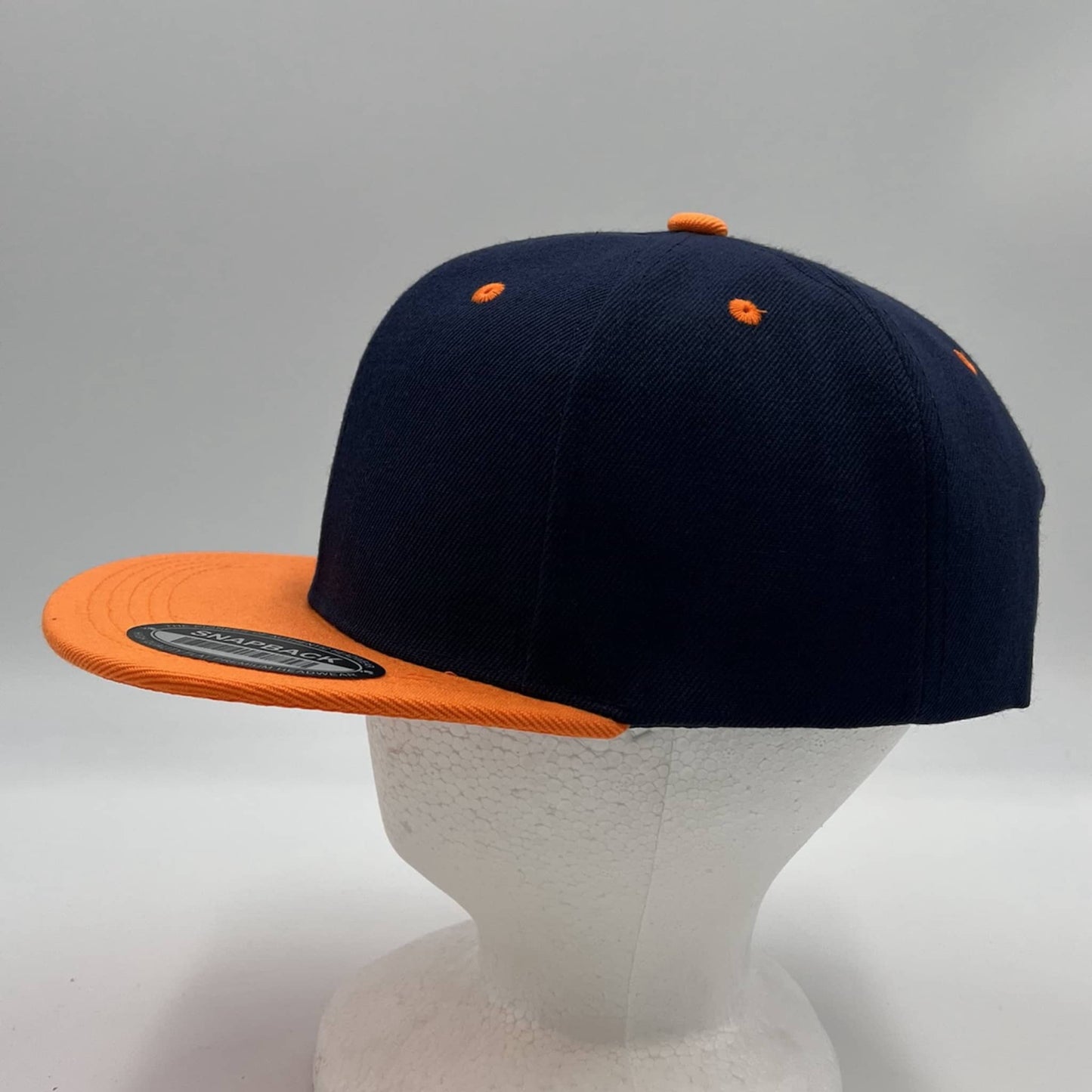 Alpha Omega Cap Plain Poly Snapback Navy Blue and Orange Eyelets/Bill 12 pack  PFS0528 Cap Hat