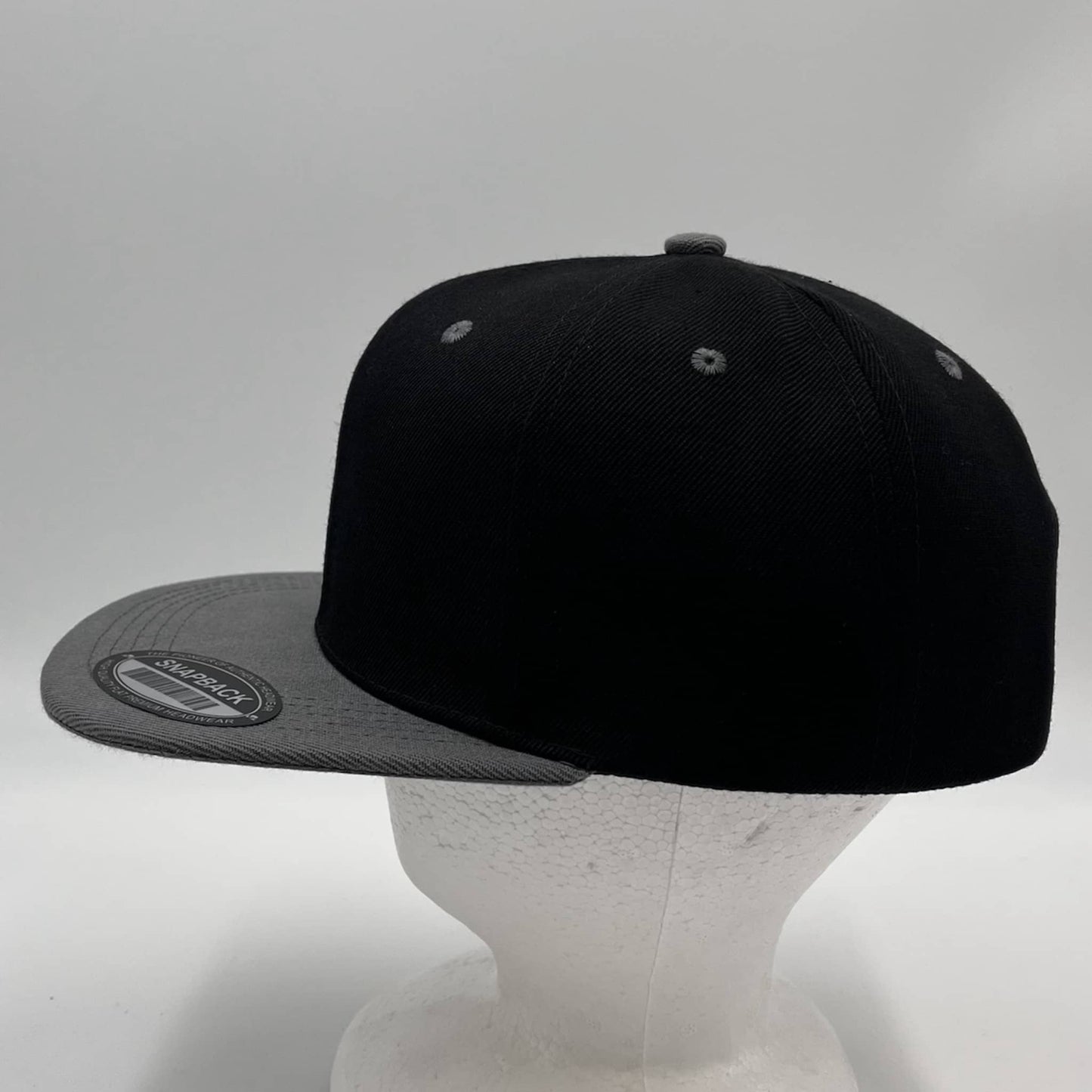 Alpha Omega Cap Plain Poly Snapback Black and Dark Gray Eyelets/Bill 12 pack PFS0543 Cap Hat