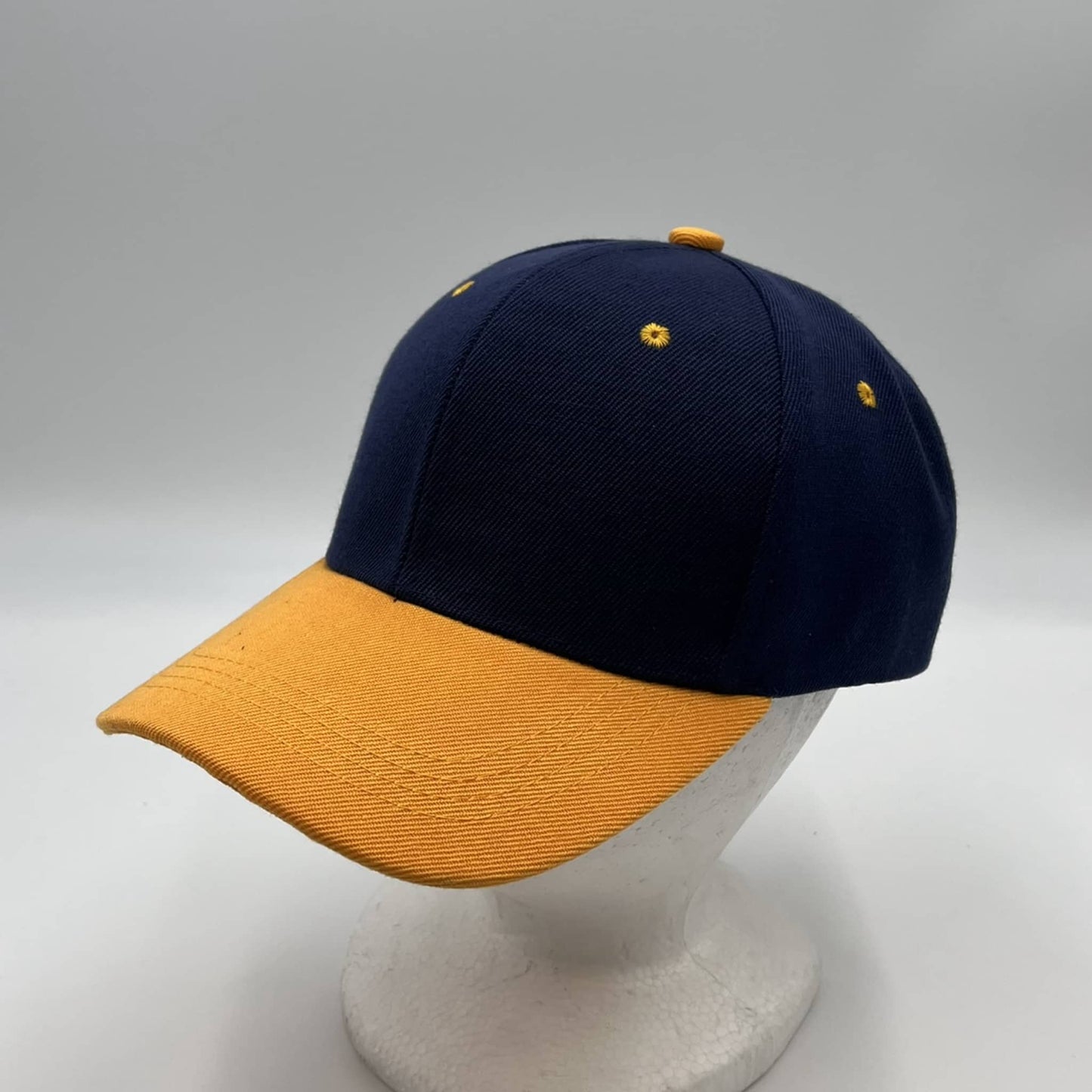 Alpha Omega Cap Plain Two Tone Velcro Navy Blue and Yellow Eyelets/Bill 12 pack PCV0204 Cap Hat