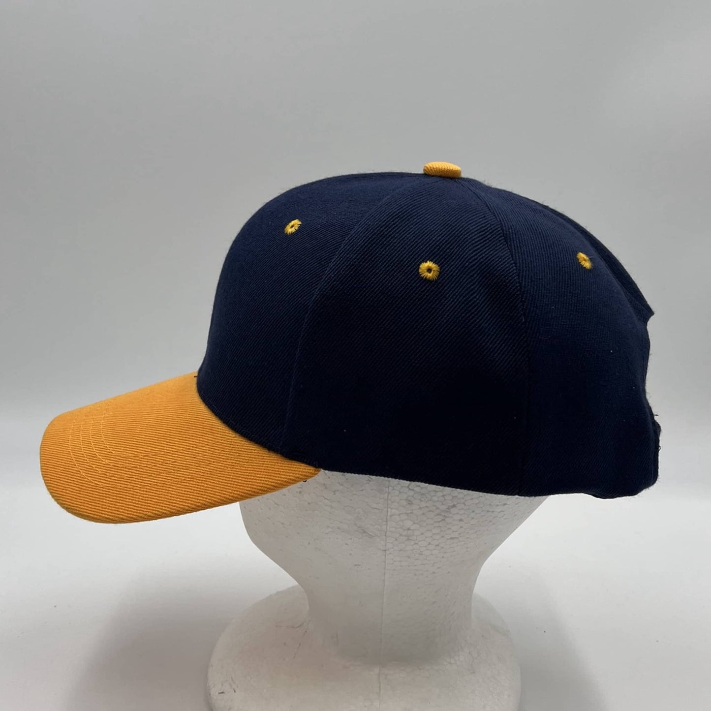 Alpha Omega Cap Plain Two Tone Velcro Navy Blue and Yellow Eyelets/Bill 12 pack PCV0204 Cap Hat