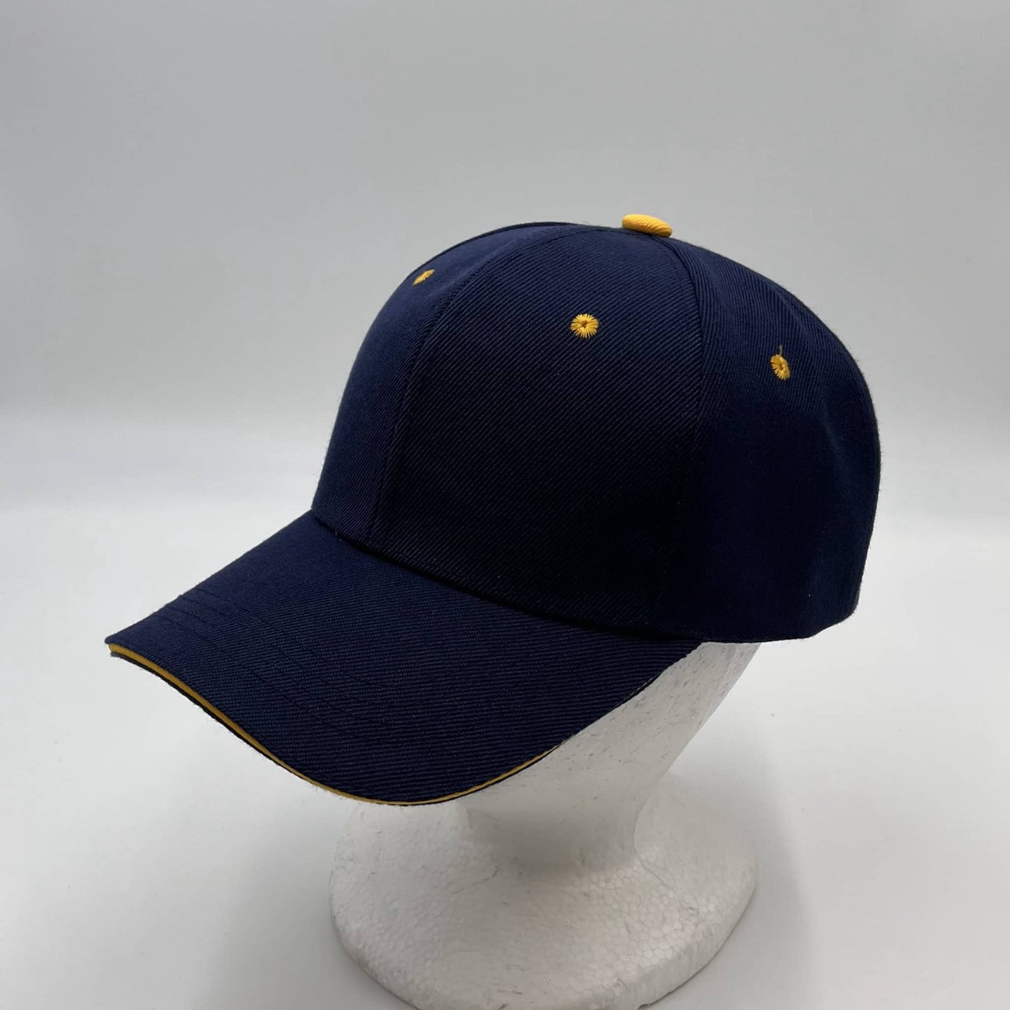 Plain Sandwich Velcro Navy Blue and Yellow Eyelets 12 pack PCV0324 Cap Hat