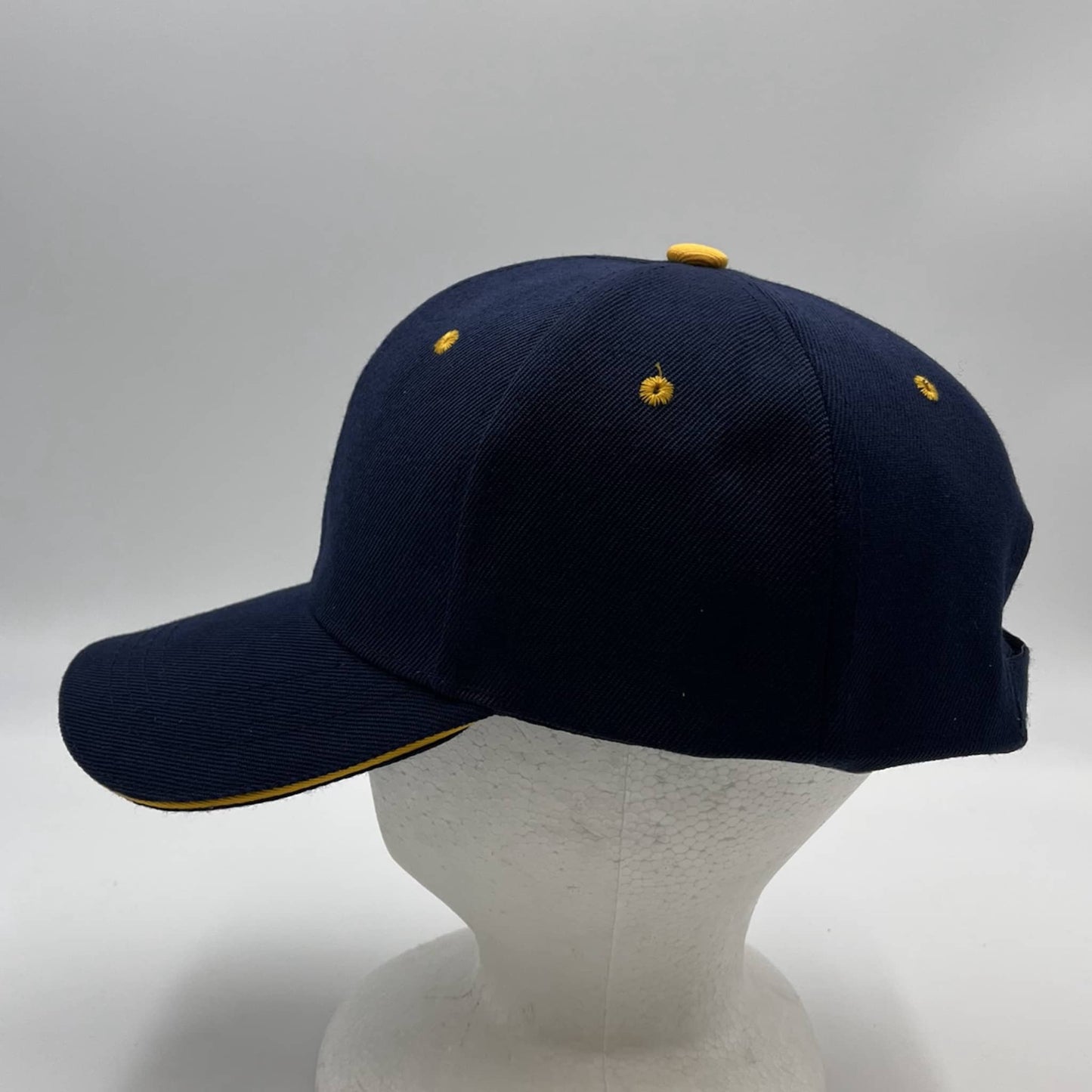 Alpha Omega Cap Plain Sandwich Velcro Navy Blue and Yellow Eyelets 12 pack PCV0324 Cap Hat