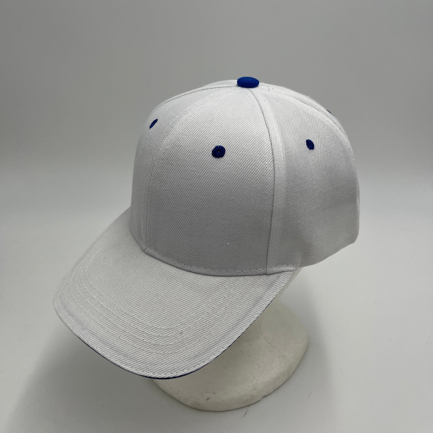 Plain Sandwich Velcro White and Navy Blue Eyelets 12 pack PCV0310 Cap Hat